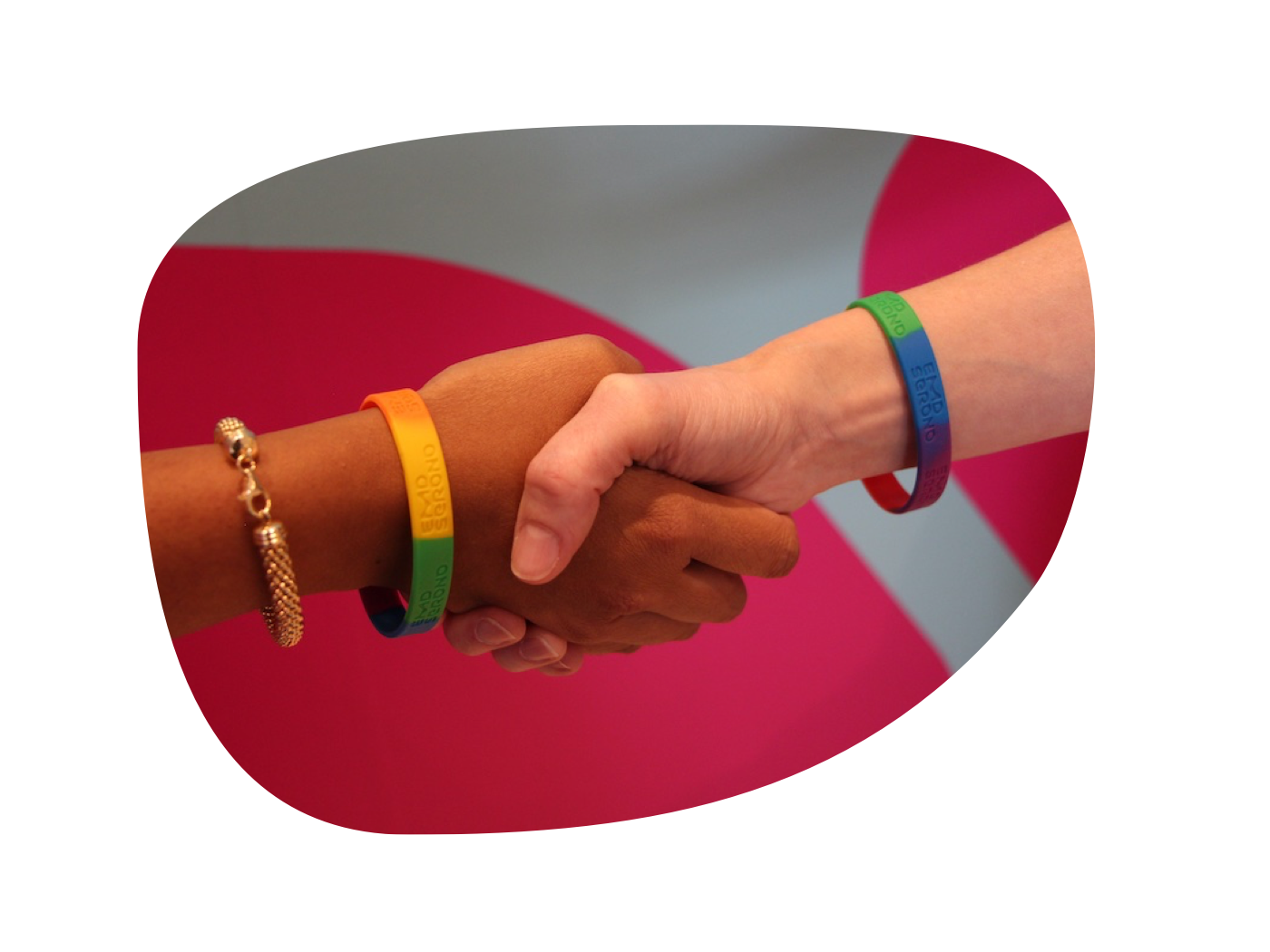 two EMD Serono employees shaking hands