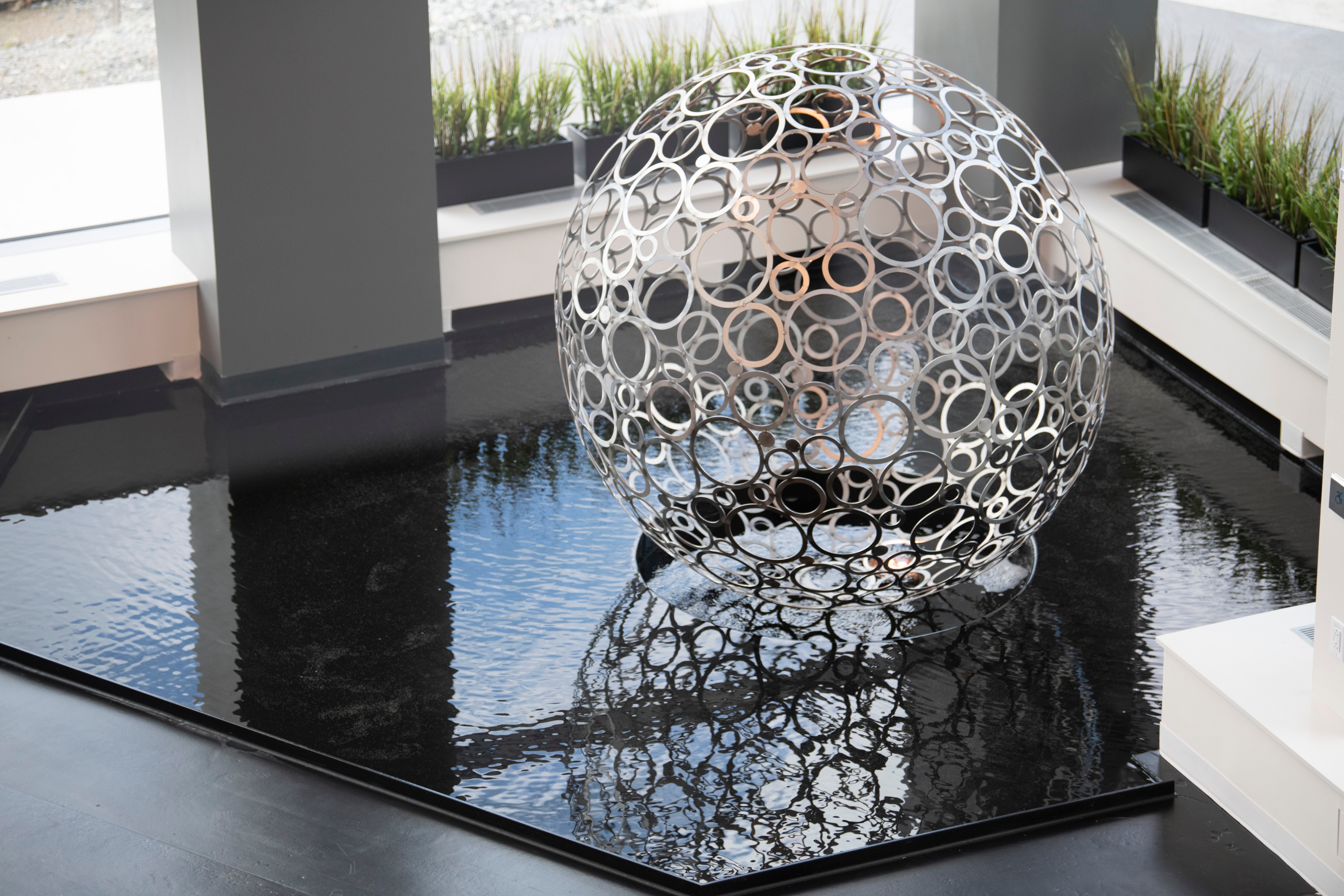 sculpture inside the EMD Serono r&d insititute in billerica, ma