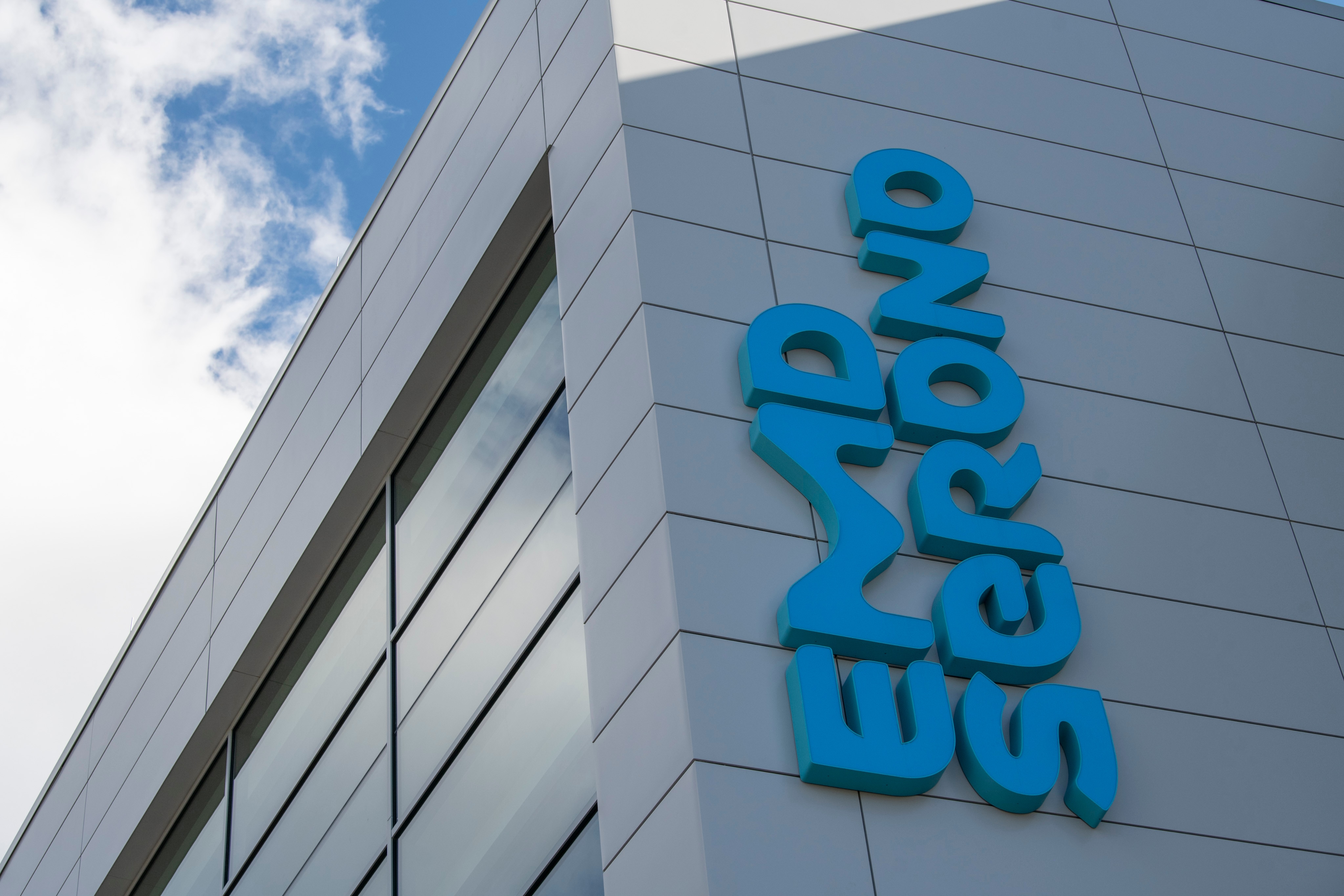 company logo on the outside of the EMD Serono r&d insititute in billerica, ma